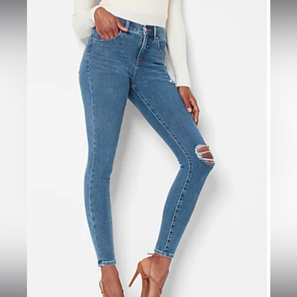 Express Mid rise hyper stretch medium wash ripped skinny jeans size 0